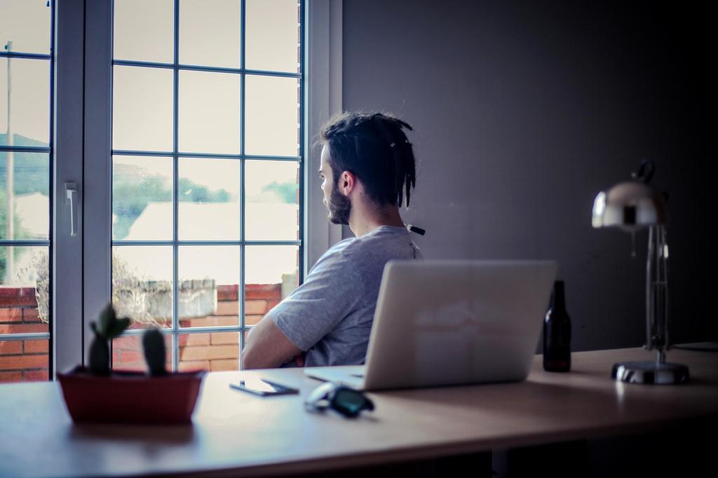 Modern LED desk lamp with adjustable arm and touch controls